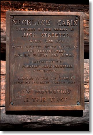 Sign on Necklace Valley Cabin